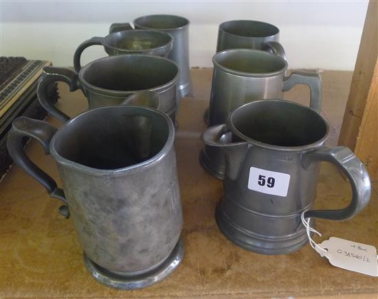 7 pewter tankards & box